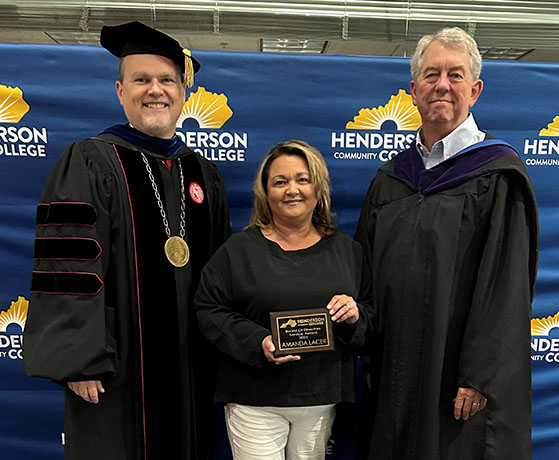 Amanda Lacer with HCC President Dr. Jason Warren and Board member Dorsey Ridley